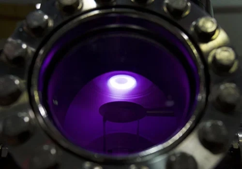 Gas and plasma density measurement through vacuum chamber window